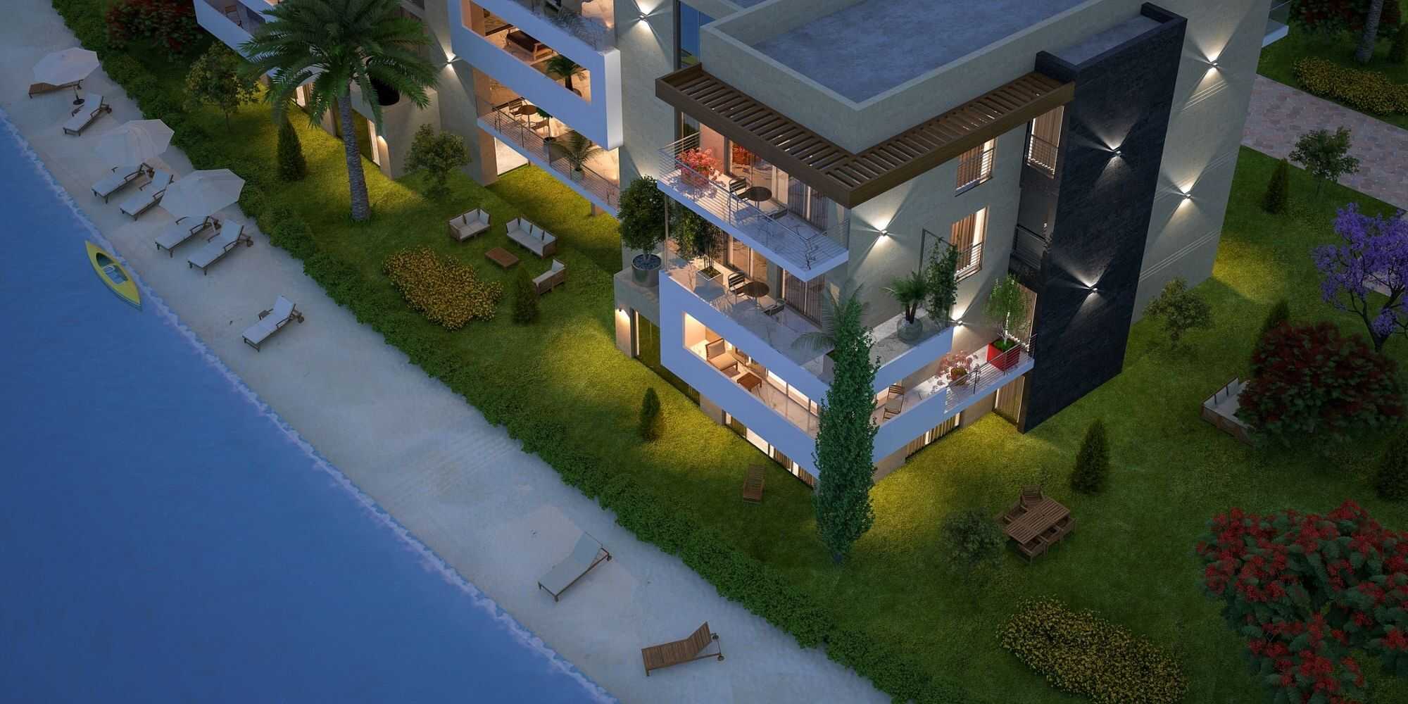 3D rendered night view of a beachside apartment with lawn in oman